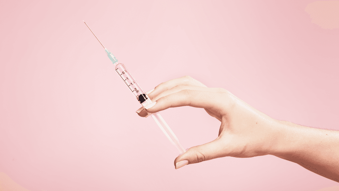 Vitamin in a syringe stock photo
