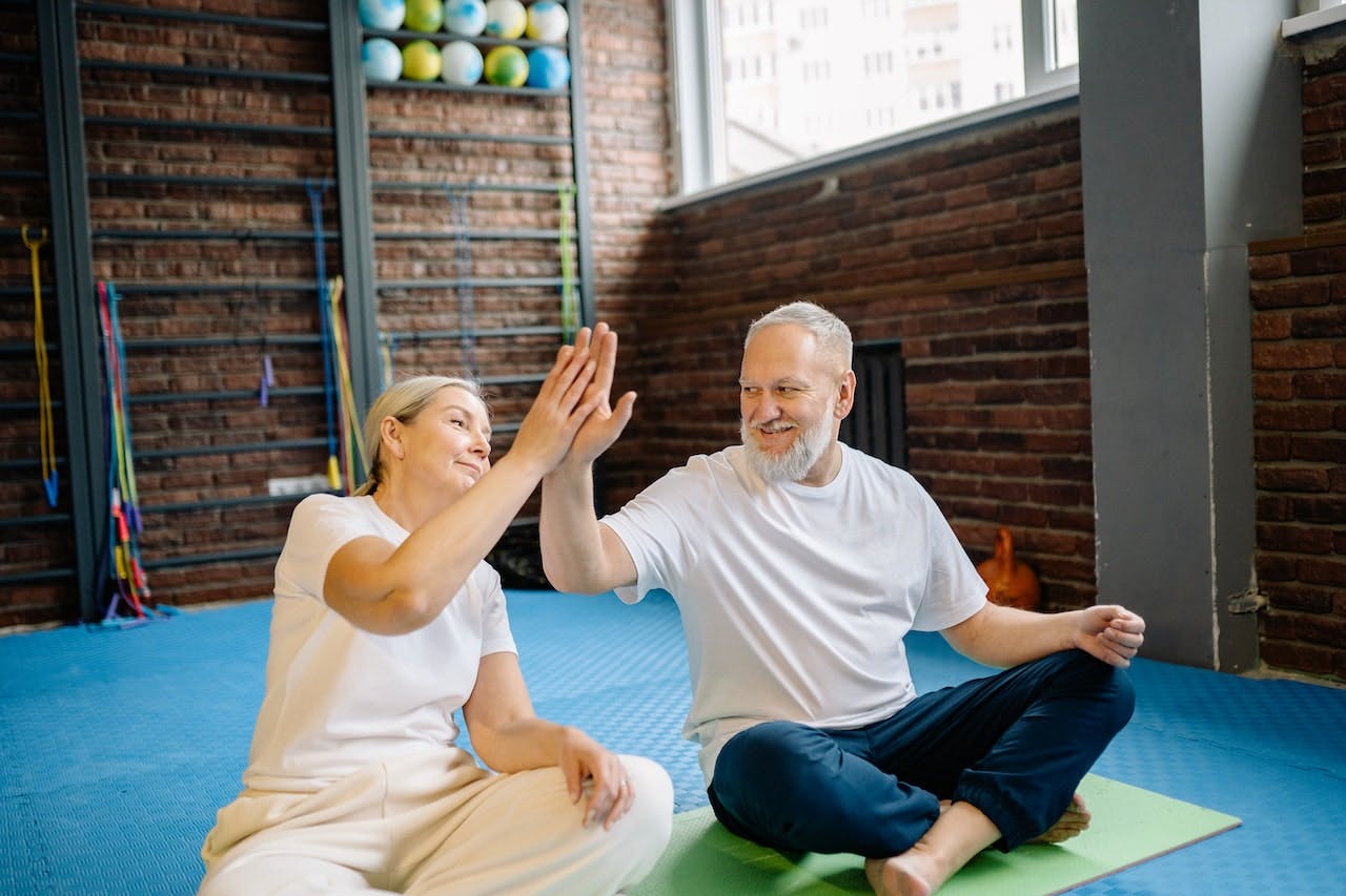 senior couple doing yoga stock image