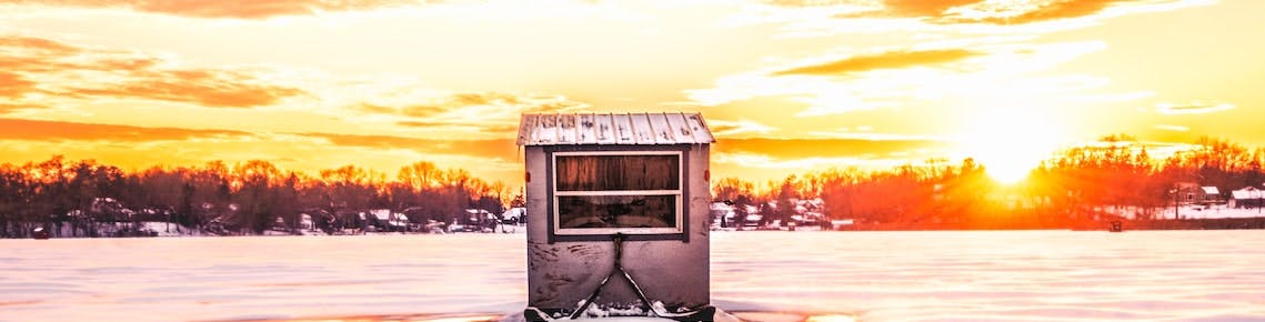 Frozen Wisconsin lake at sunset